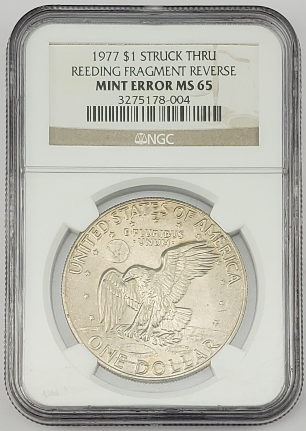 1977 Eisenhower Dollar Struck Thru Reeding Fragment Reverse Mint Error NGC MS 65
