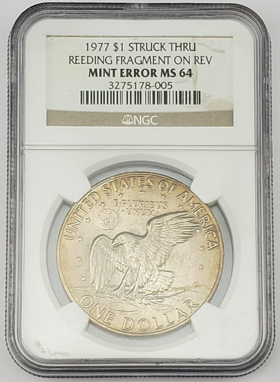 1977 Eisenhower Dollar Struck Thru Reeding Fragment On Rev NGC Mint Error MS 64