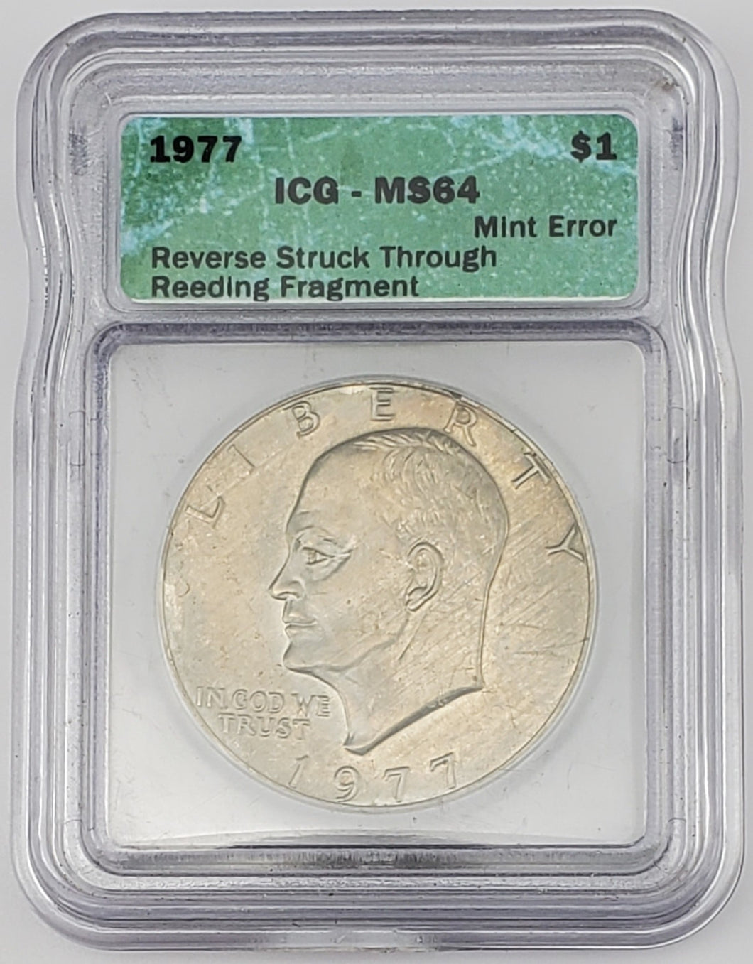 1977 Eisenhower Dollar Reverse Struck Thru Reeding Fragment Mint Error ICG MS 64